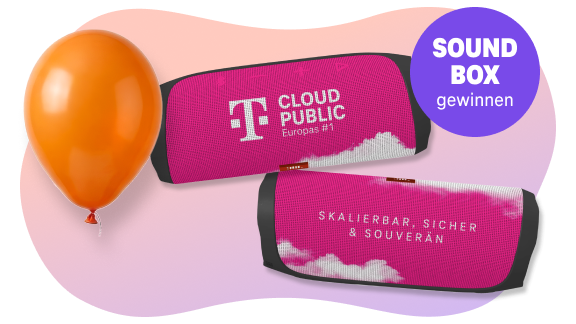Eine JBL Magenta Soundbox mit Luftballons